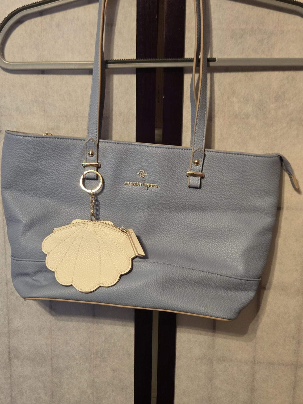 Nanette Lepore Light Blue Leather Tote with Cream Shell Charm